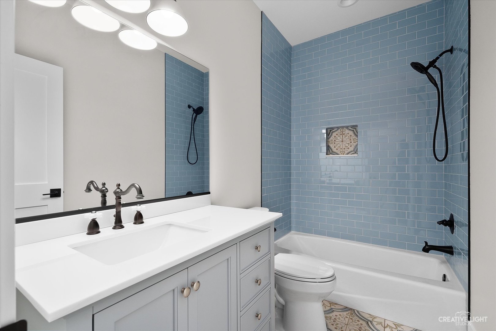 4764 Minooka Road Minooka, IL 60447 - Photo 30 of 39 a bathroom with a sink a toilet and shower