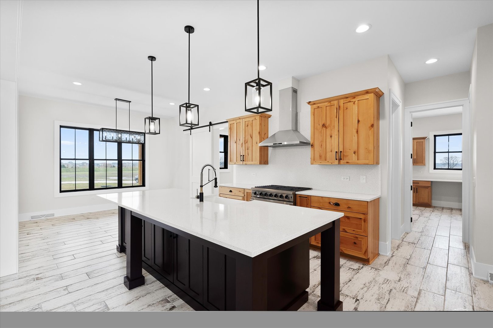 4764 Minooka Road Minooka, IL 60447 - Photo 7 of 39 a kitchen with a sink a stove and cabinets