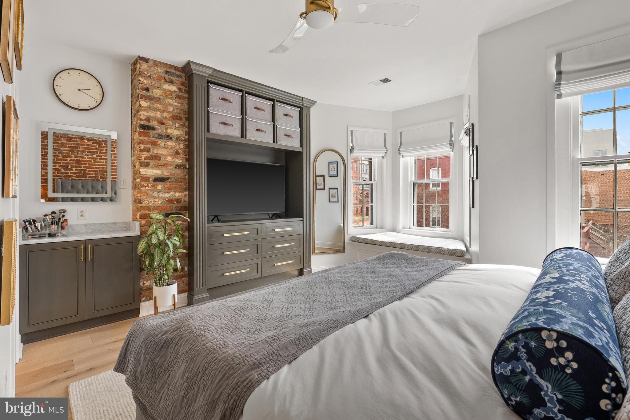 520 D Street Northeast Washington, DC 20002 - Photo 6 of 15 a bedroom with a bed and a television