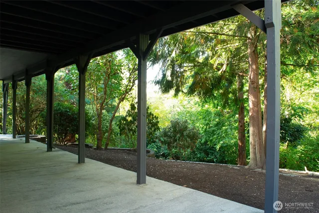 a backyard of a house with lots of green space