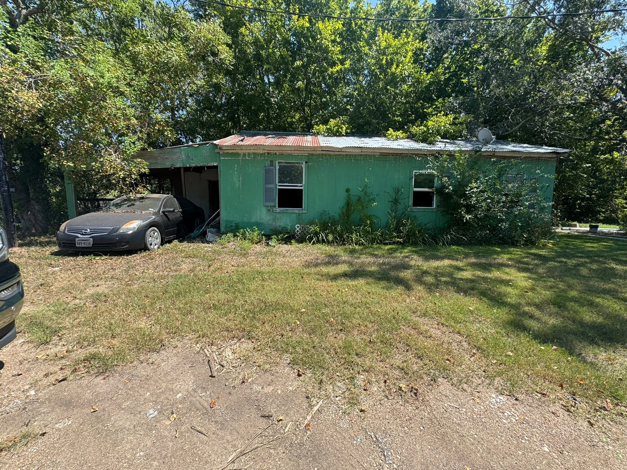 3002 County Road 166 Road Wharton, TX 77488 - Photo 4 of 6 a view of house with yard and potted plants