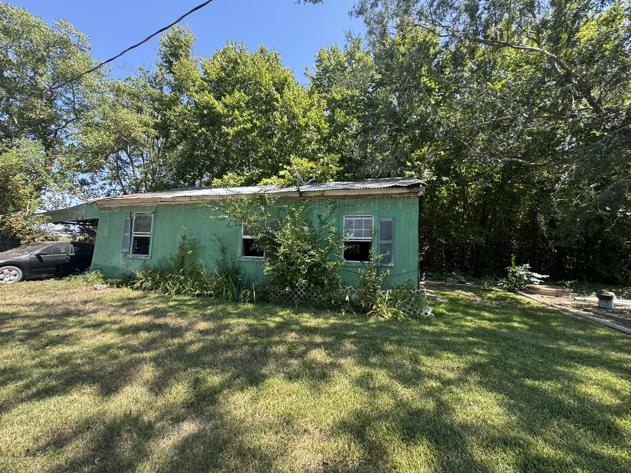 3002 County Road 166 Road Wharton, TX 77488 - Photo 5 of 6 a view of a house with a yard