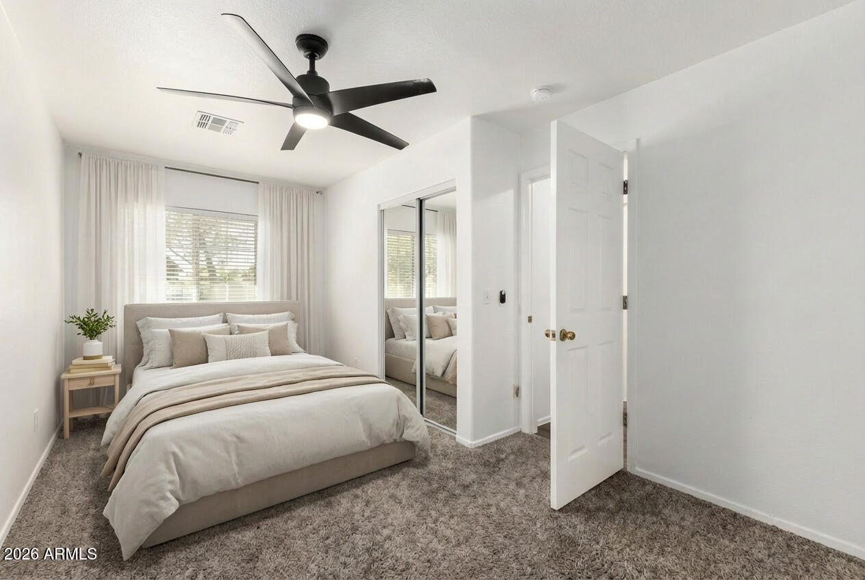 970 West Aspen Way Gilbert, AZ 85233 - Photo 14 of 36 a bedroom with a bed and a window