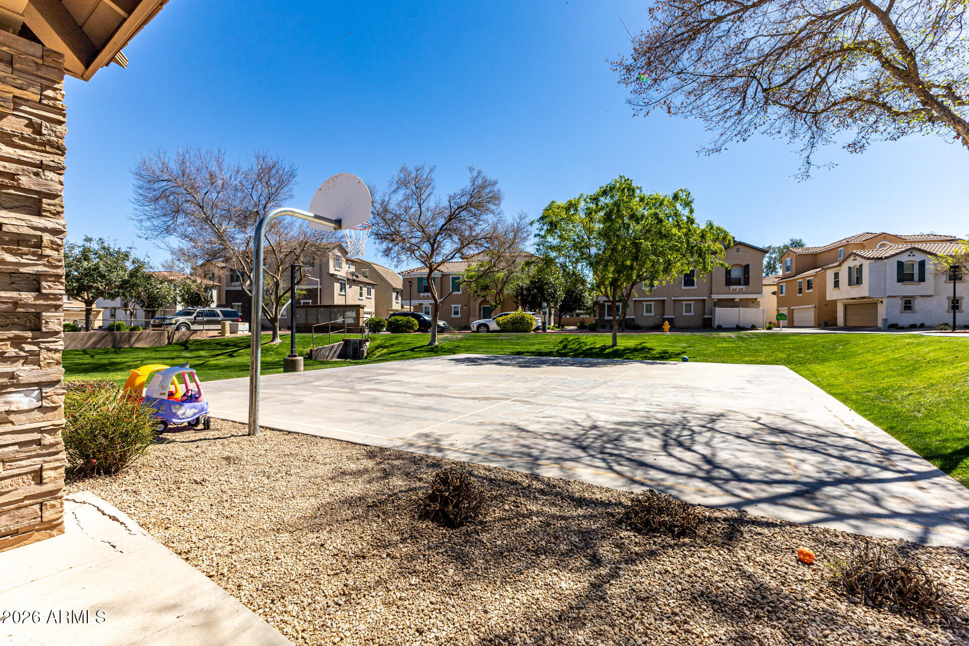 970 West Aspen Way Gilbert, AZ 85233 - Photo 29 of 36 a view of a street with a building in the background