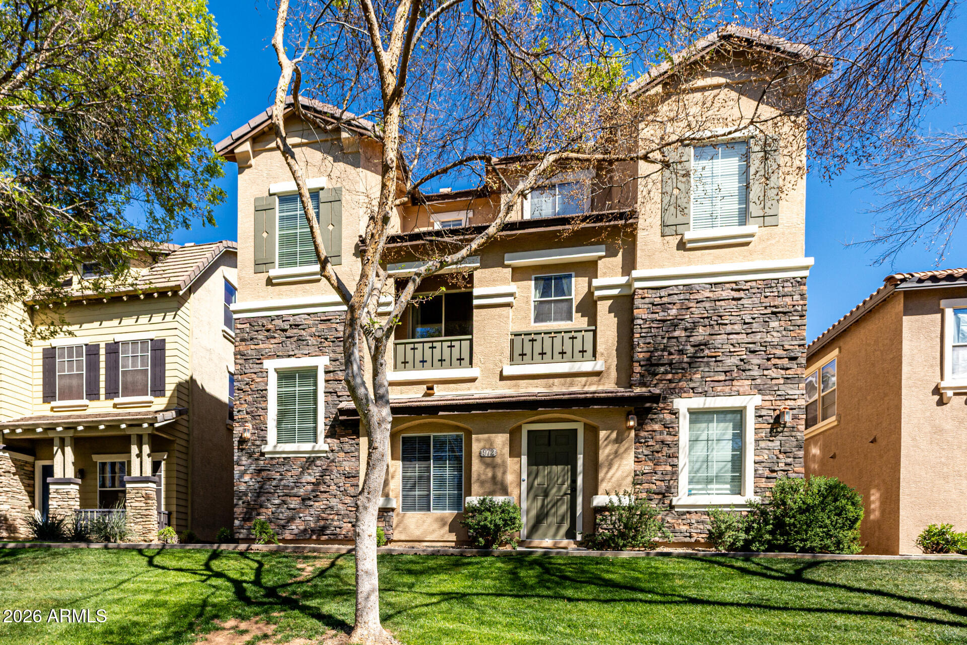970 West Aspen Way Gilbert, AZ 85233 - Photo 33 of 36 a front view of a house with garden