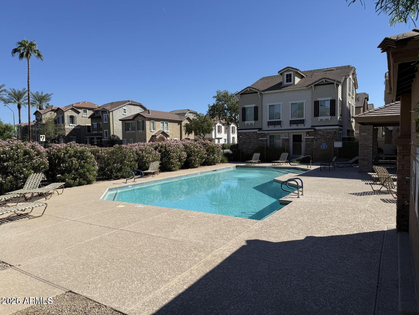 970 West Aspen Way Gilbert, AZ 85233 - Photo 35 of 36 a front view of a house with a yard