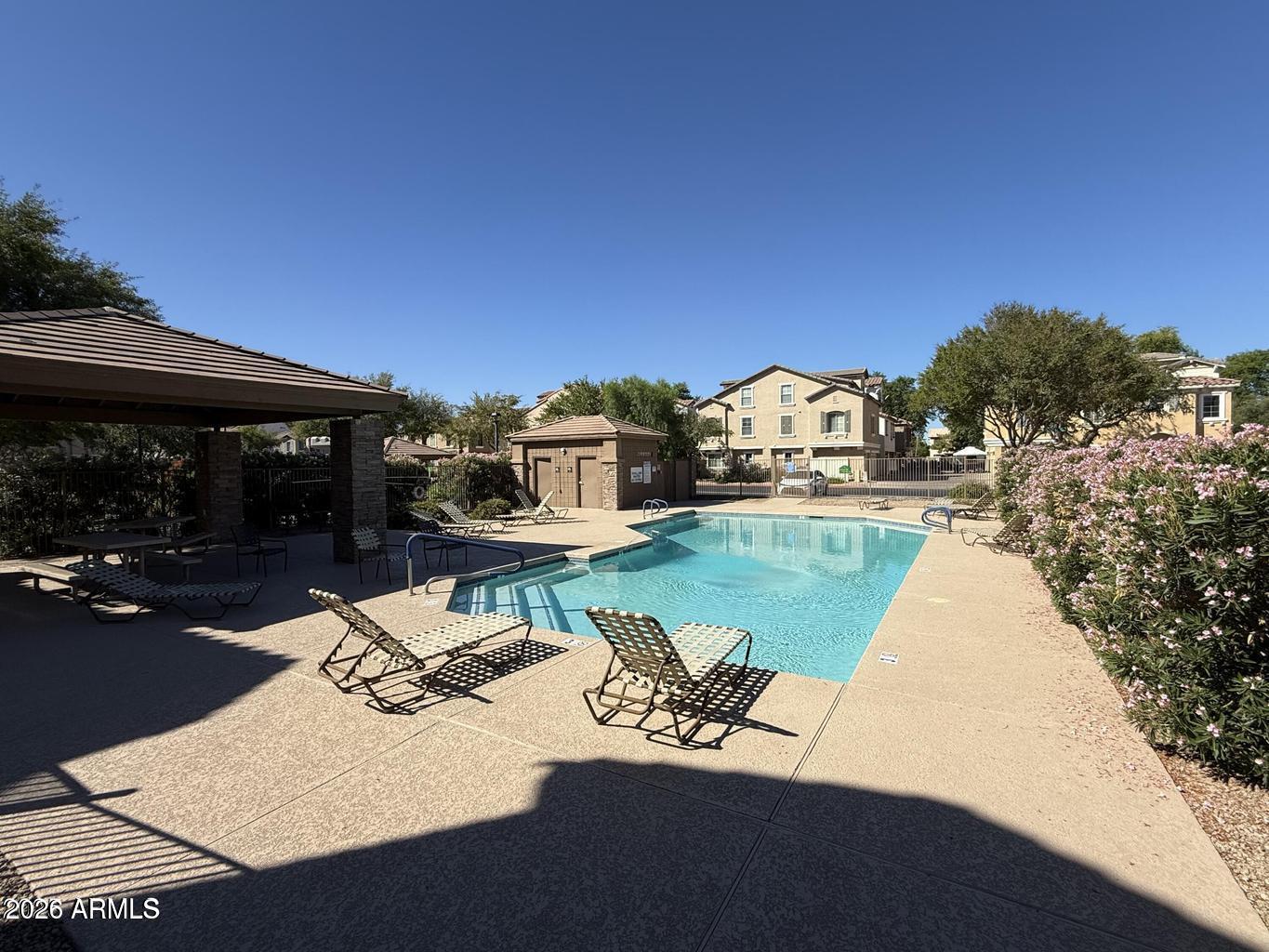 970 West Aspen Way Gilbert, AZ 85233 - Photo 36 of 36 a view of a house with pool and a yard