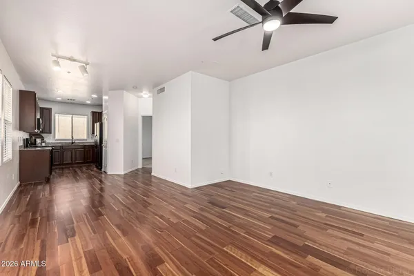 a view of a livingroom with wooden floor