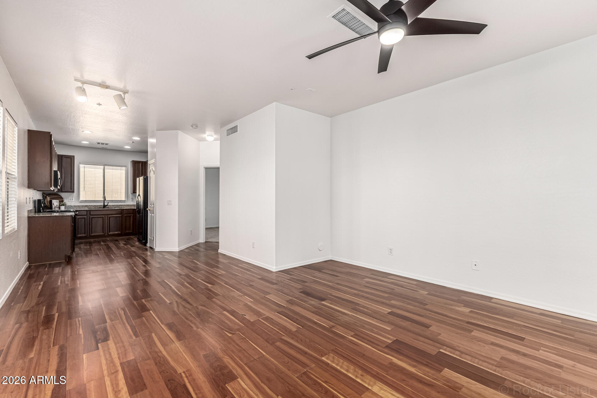 970 West Aspen Way Gilbert, AZ 85233 - Photo 8 of 36 a view of a livingroom with wooden floor