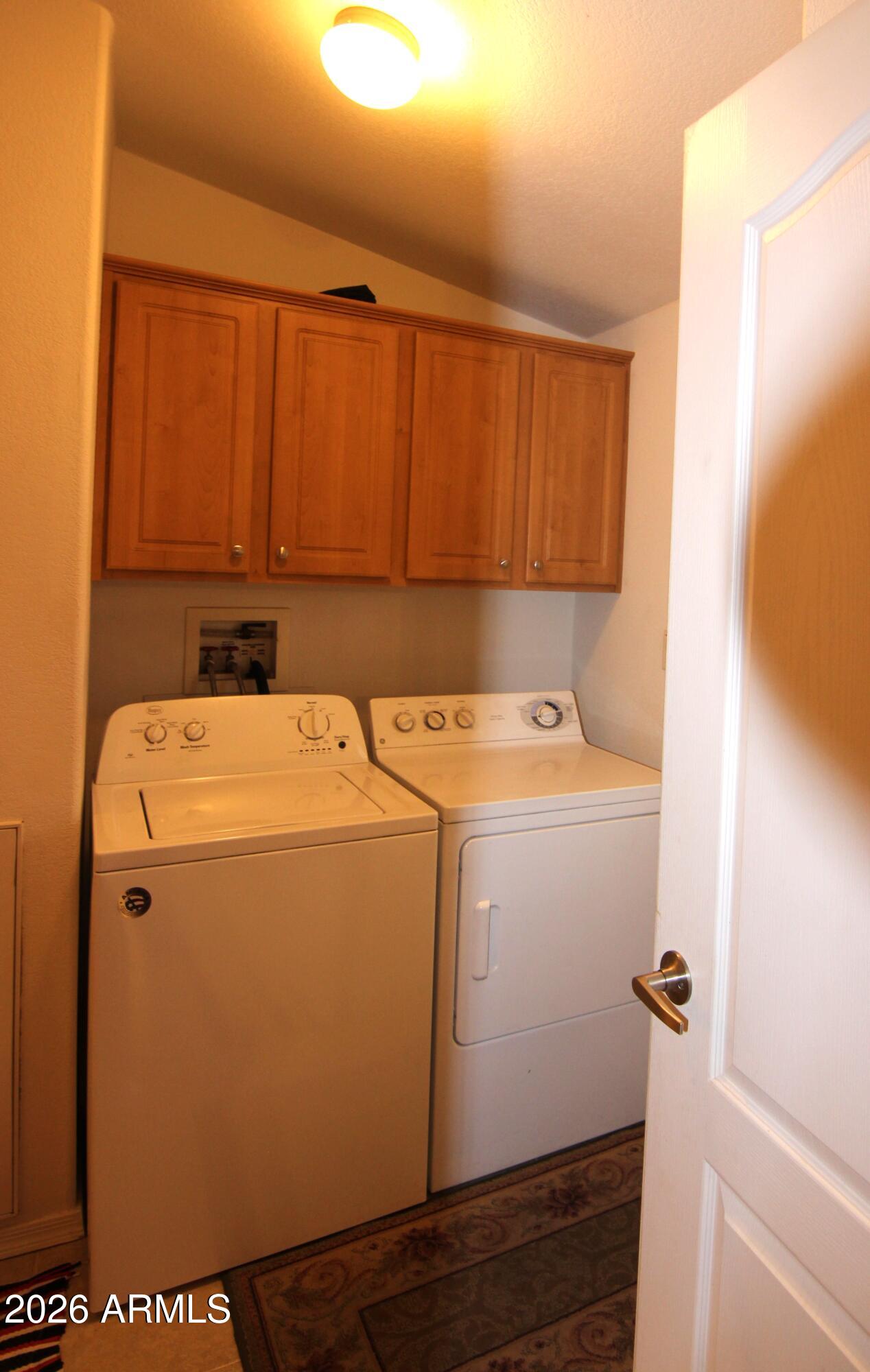 201 South Greenfield Road, Unit 268 Mesa, AZ 85206 - Photo 10 of 22 a utility room with dryer and washer