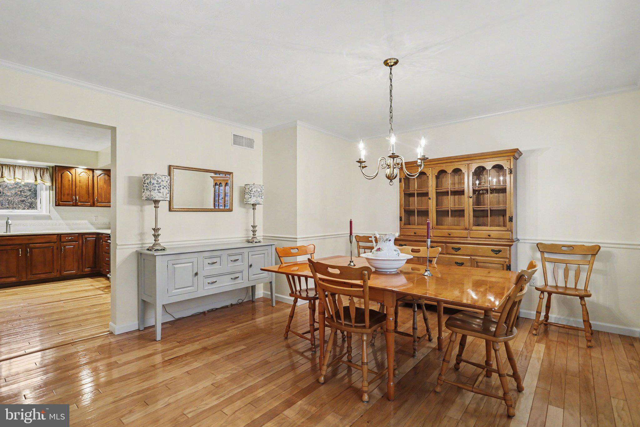 75 Longview Boulevard Gettysburg, PA 17325 - Photo 12 of 47 a view of a dining room with furniture and wooden floor