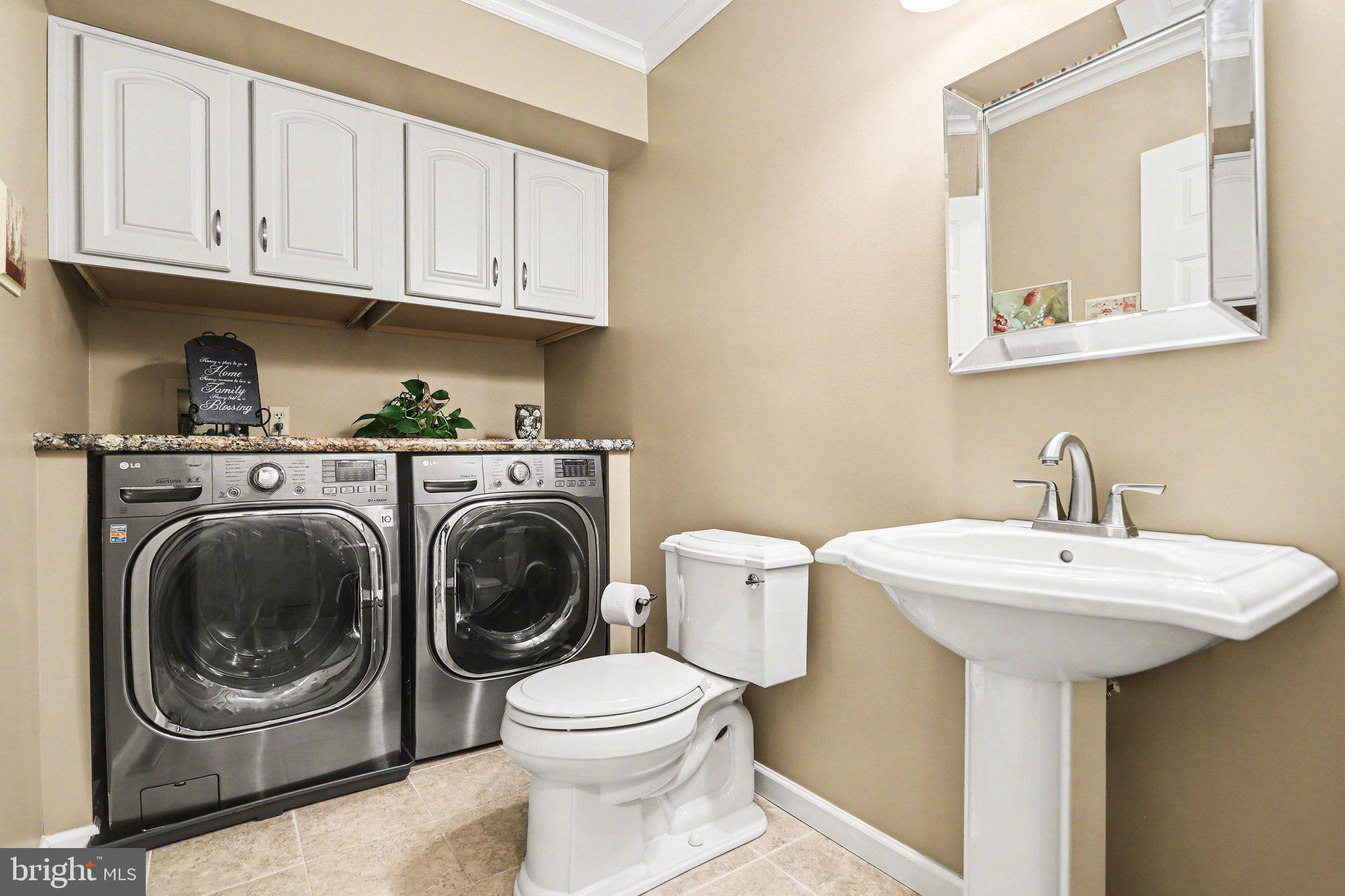 75 Longview Boulevard Gettysburg, PA 17325 - Photo 16 of 47 a bathroom with a sink a washer and dryer