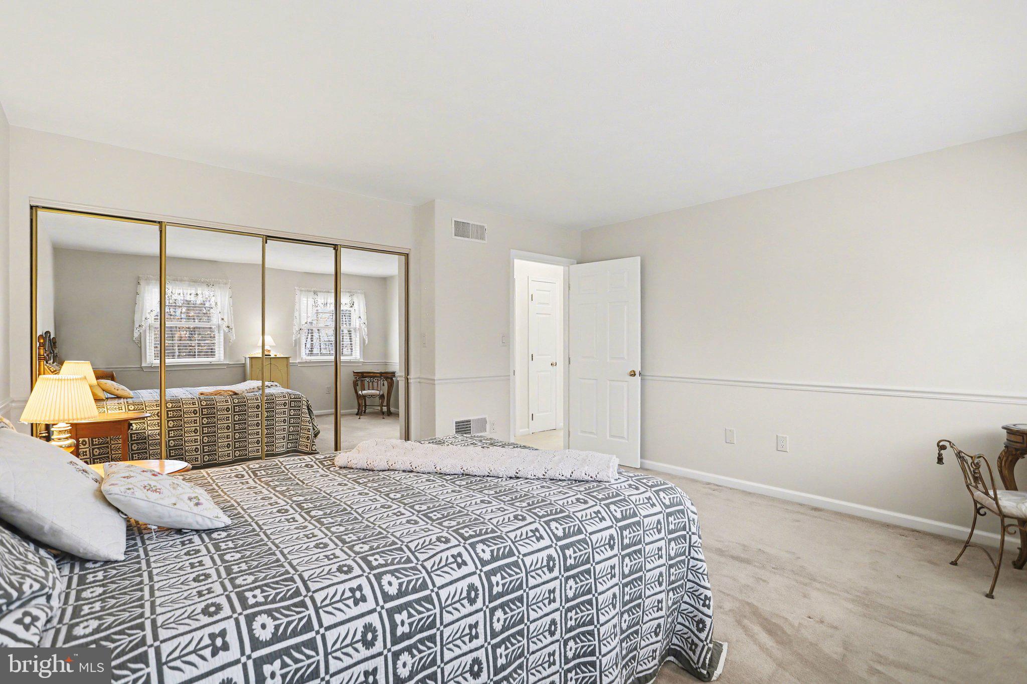 75 Longview Boulevard Gettysburg, PA 17325 - Photo 26 of 47 a bedroom with a bed and glass door