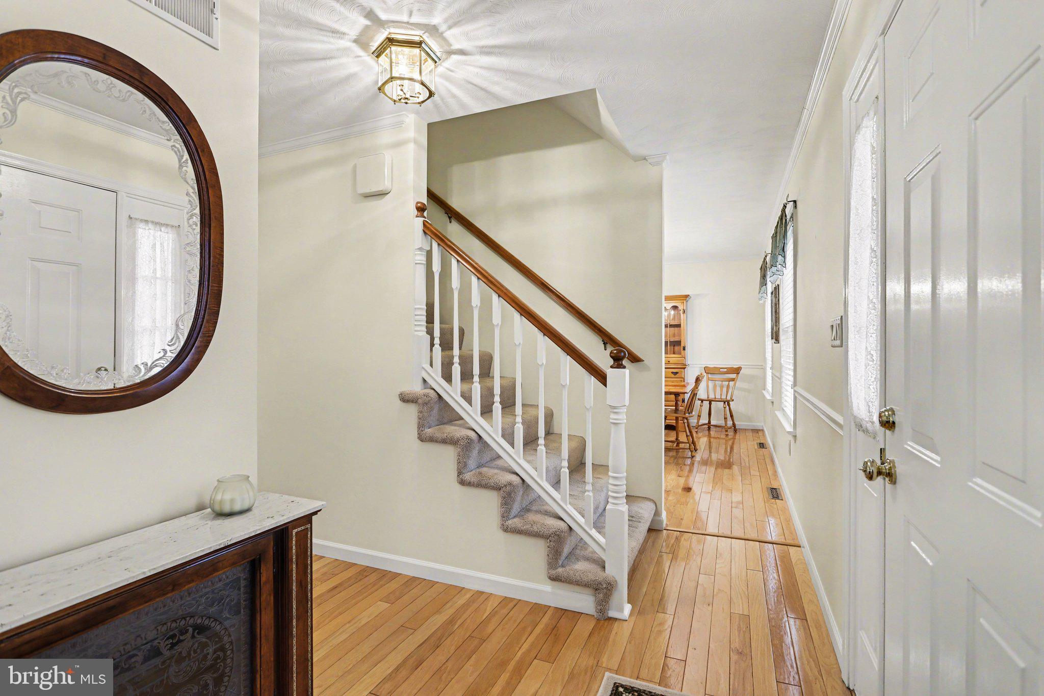 75 Longview Boulevard Gettysburg, PA 17325 - Photo 3 of 47 a view of a hallway with wooden floor and entryway