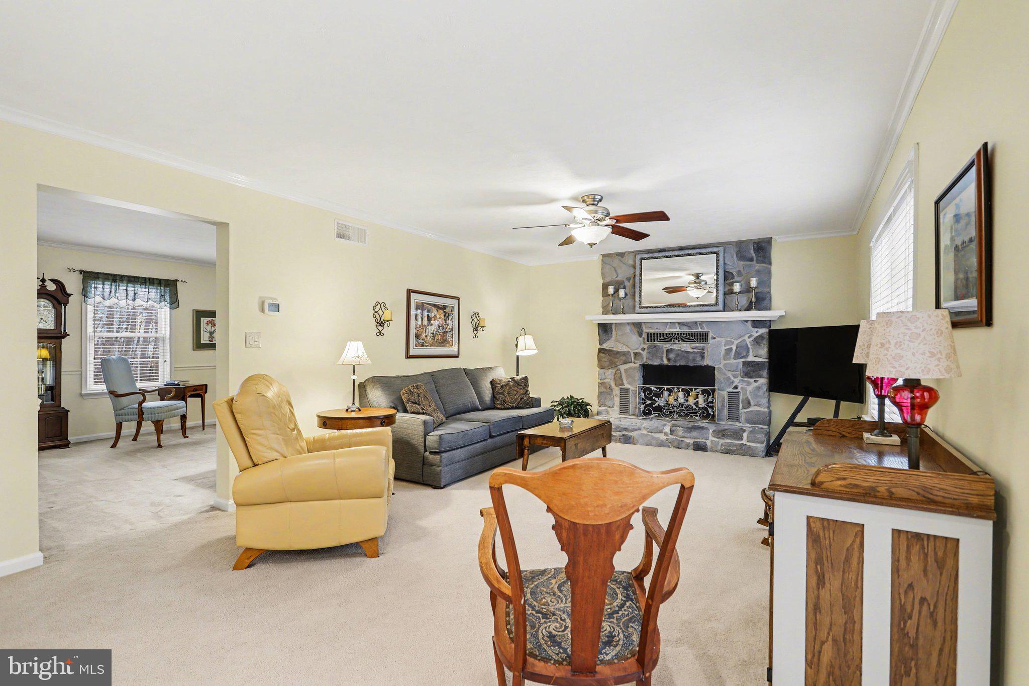 75 Longview Boulevard Gettysburg, PA 17325 - Photo 5 of 47 a living room with furniture and a fireplace