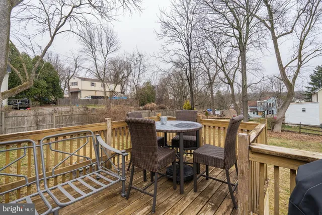 a view of a chairs and table on the deck