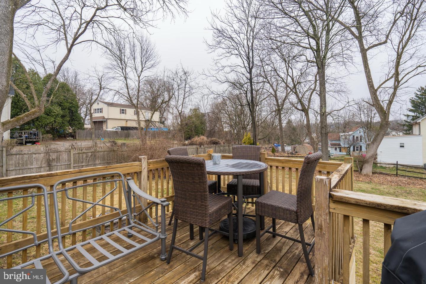 994 Upper Gulph Road Wayne, PA 19087 - Photo 21 of 24 a view of a chairs and table on the deck