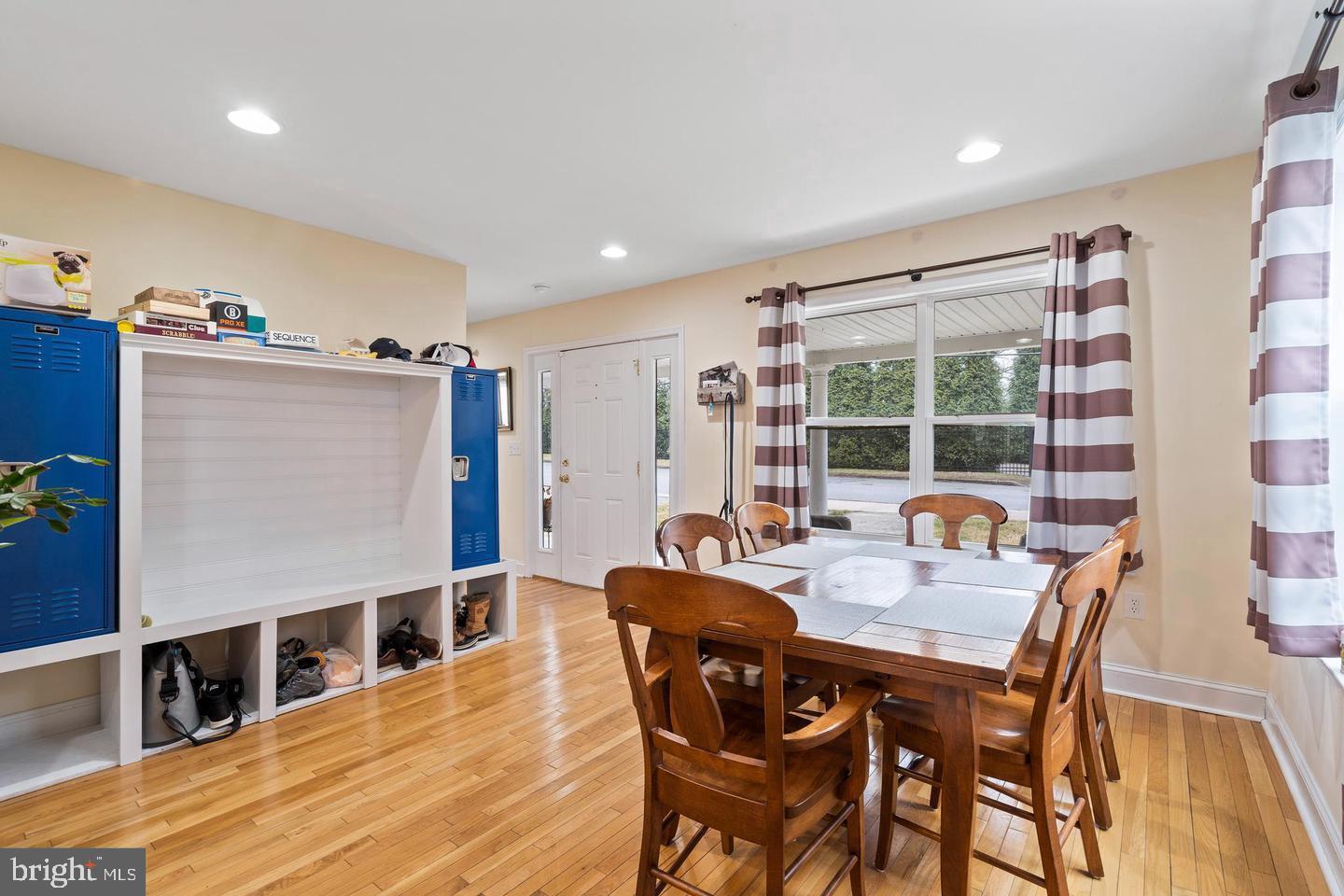 994 Upper Gulph Road Wayne, PA 19087 - Photo 9 of 24 a dining room with wooden floor and furniture