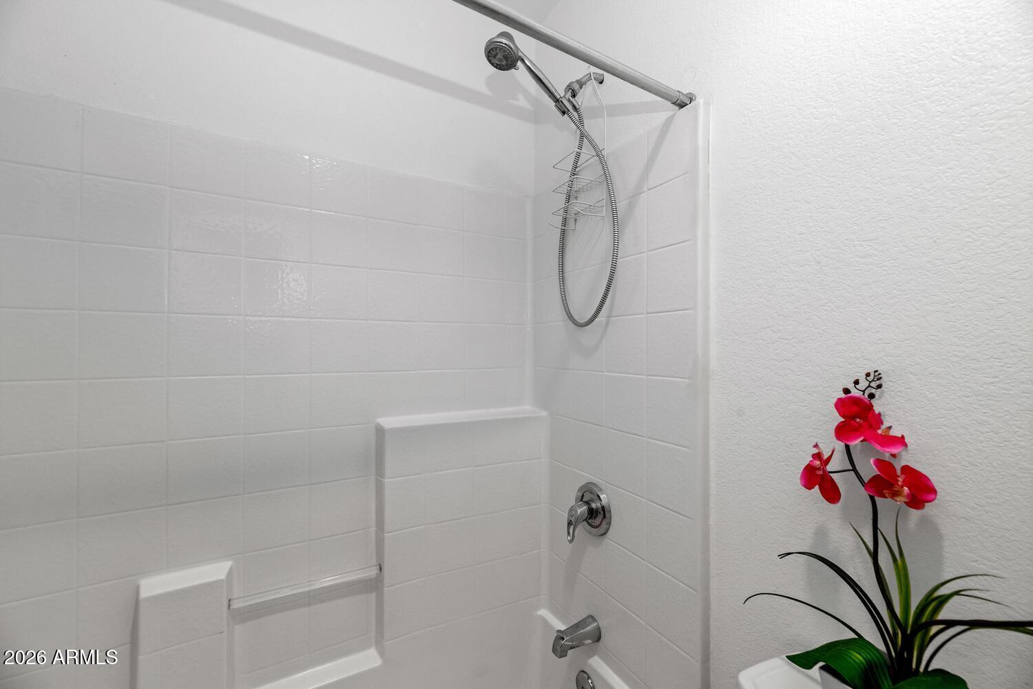 860 North McQueen Road, Unit 1121 Chandler, AZ 85225 - Photo 13 of 24 a bathroom with a shower