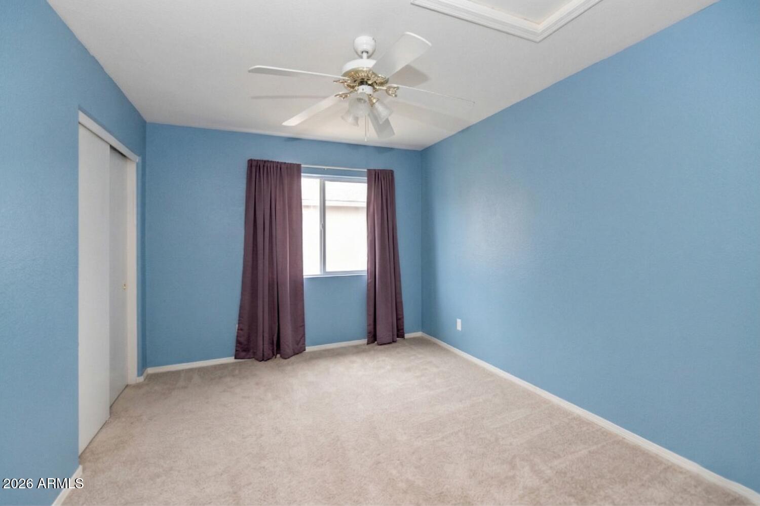 860 North McQueen Road, Unit 1121 Chandler, AZ 85225 - Photo 16 of 24 wooden floor in an empty room with a window