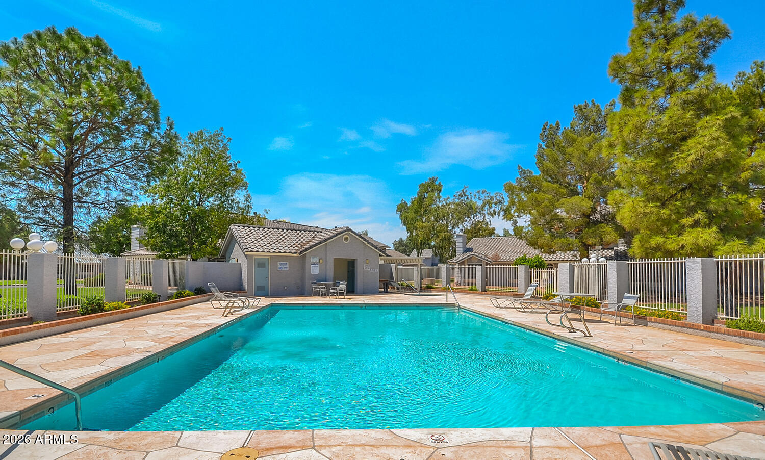 860 North McQueen Road, Unit 1121 Chandler, AZ 85225 - Photo 23 of 24 a view of a house with swimming pool