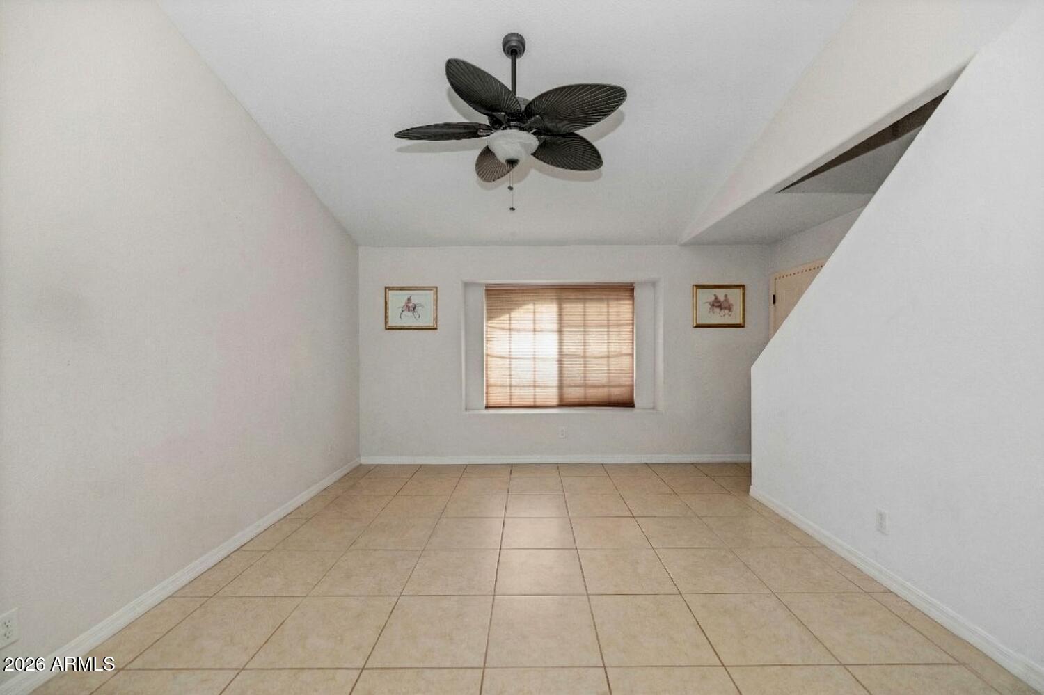 860 North McQueen Road, Unit 1121 Chandler, AZ 85225 - Photo 6 of 24 a view of an empty room with a window