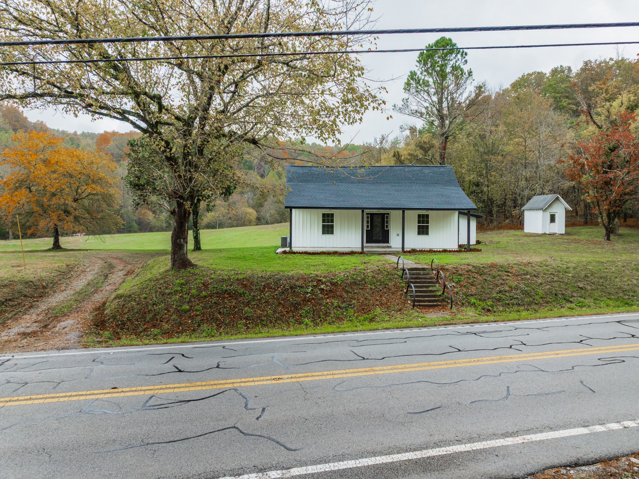 2635 McBrides Branch Road Beechgrove, TN 37018 - Photo 1 of 54 front view of house with a yard