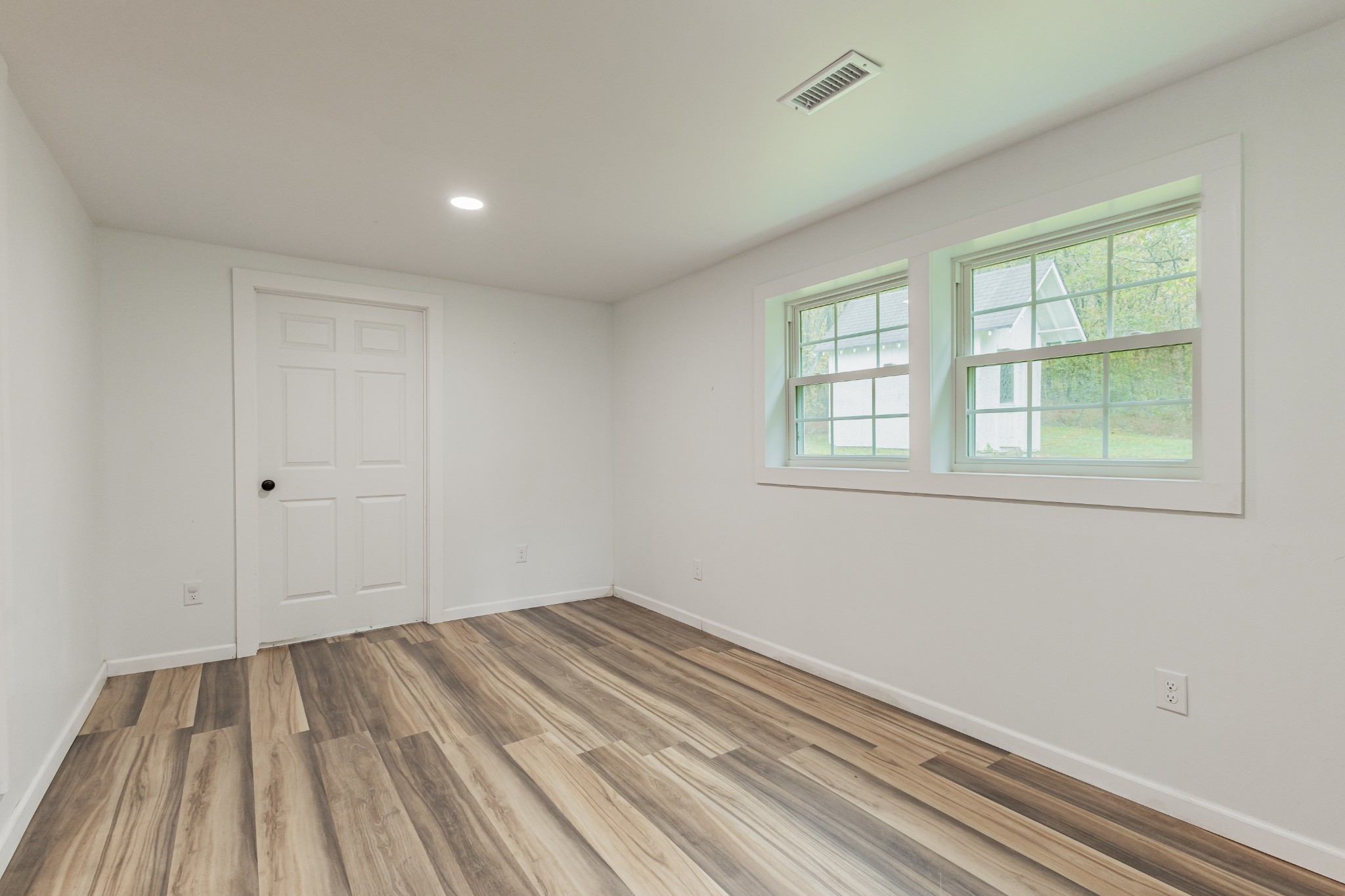 2635 McBrides Branch Road Beechgrove, TN 37018 - Photo 24 of 54 a view of a room with wooden floor and natural light