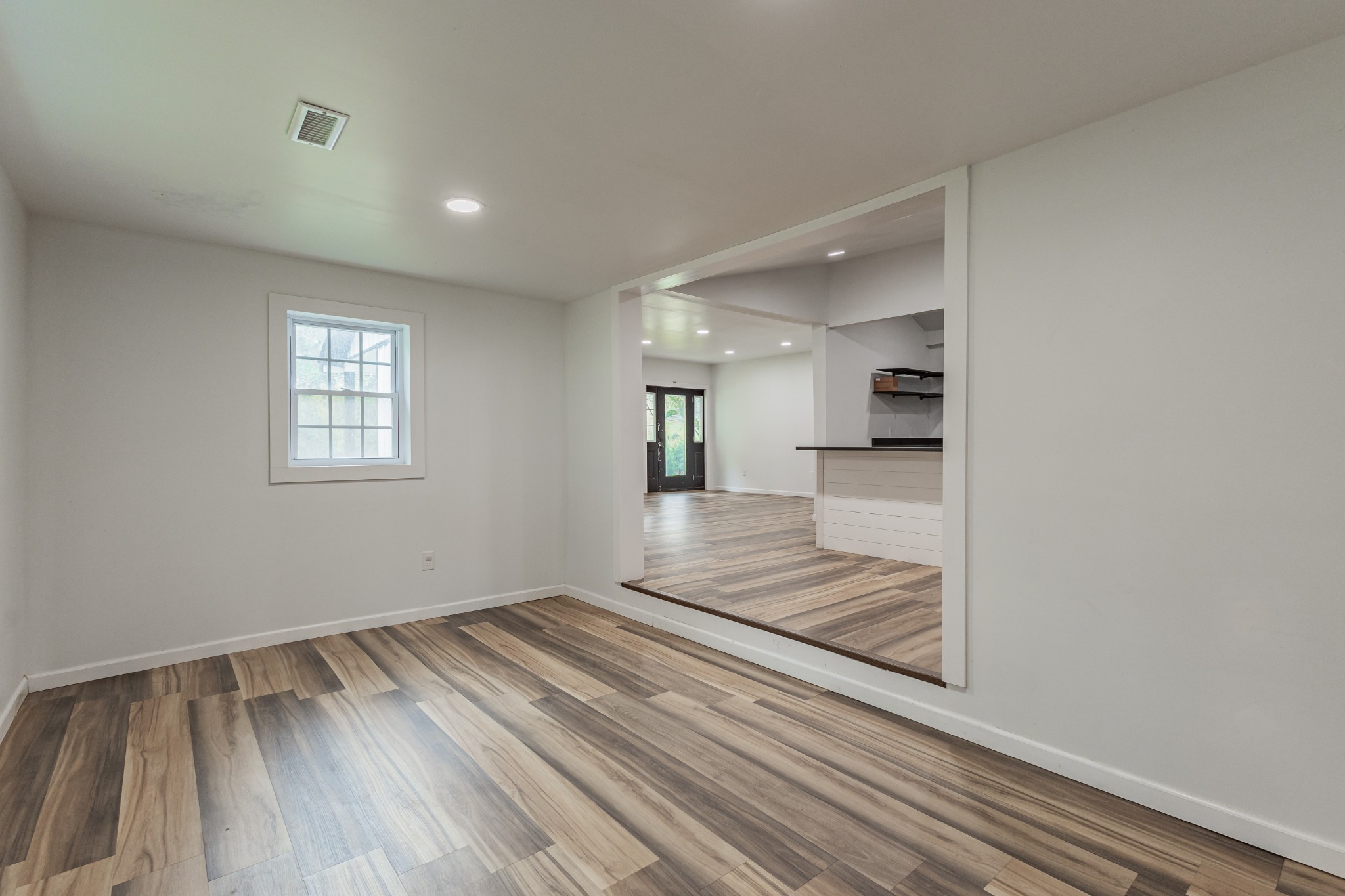 2635 McBrides Branch Road Beechgrove, TN 37018 - Photo 26 of 54 wooden floor in an empty room with a window