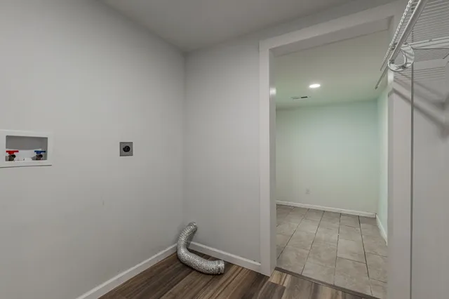 a view of an empty room and window