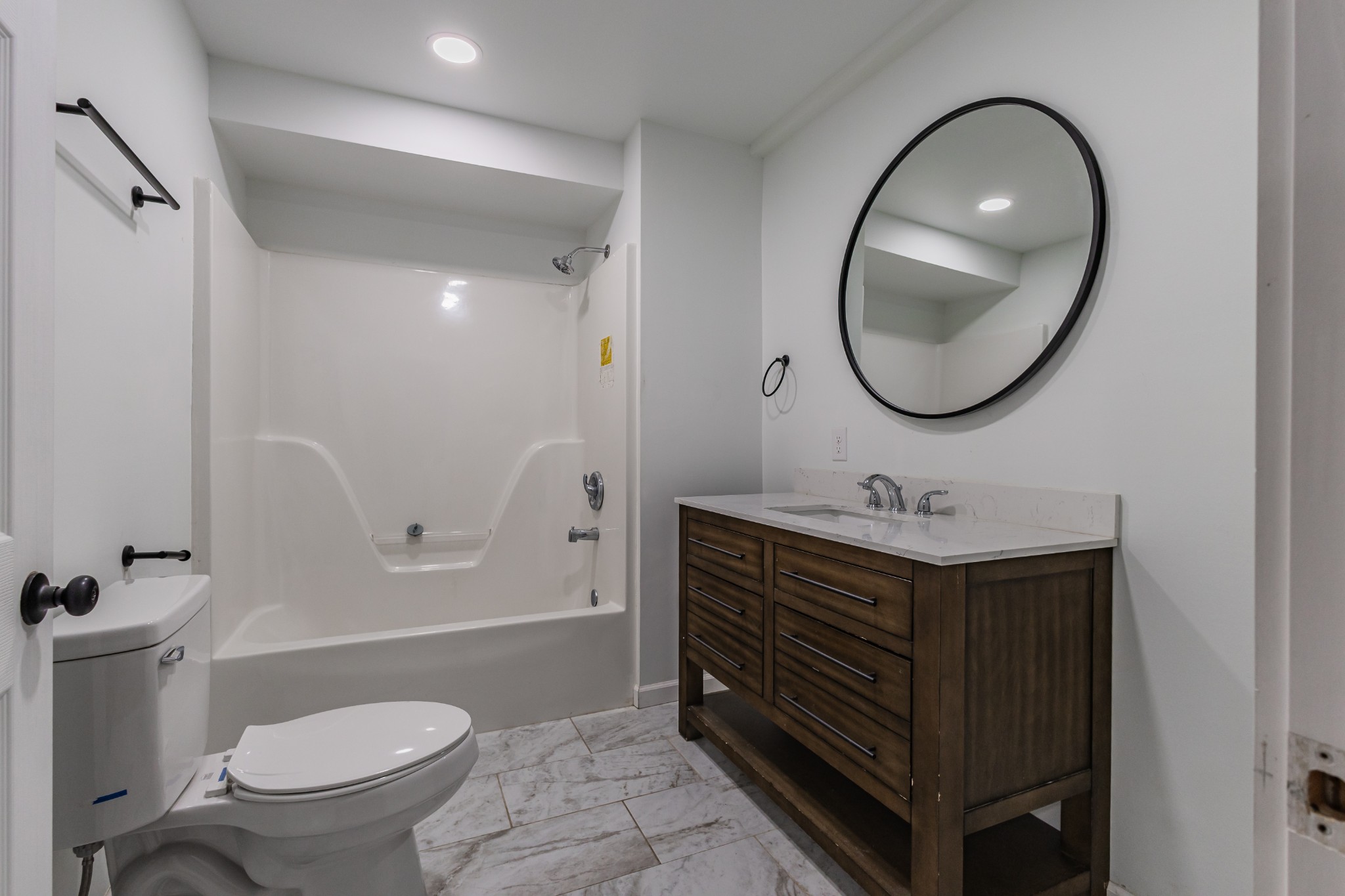 2635 McBrides Branch Road Beechgrove, TN 37018 - Photo 33 of 54 a bathroom with a toilet a sink and a mirror