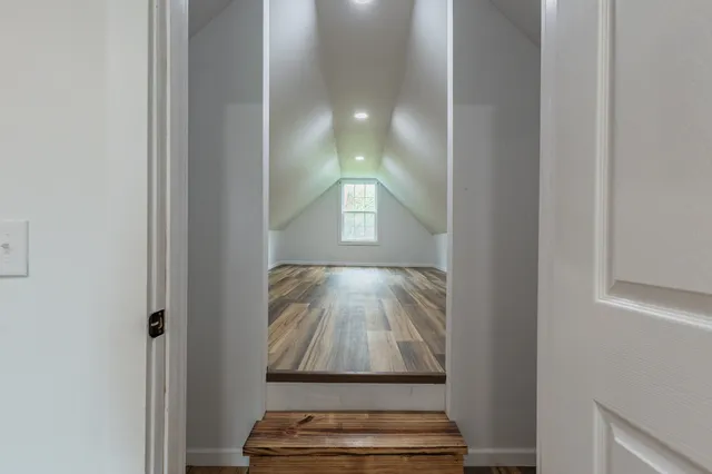 a view of a garden from a balcony