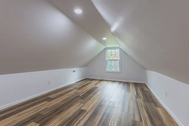 a view of a garden from a balcony