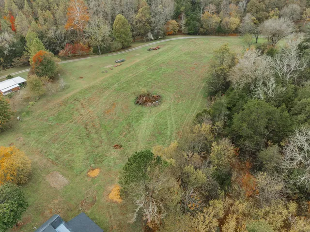 a view of swimming pool from a balcony