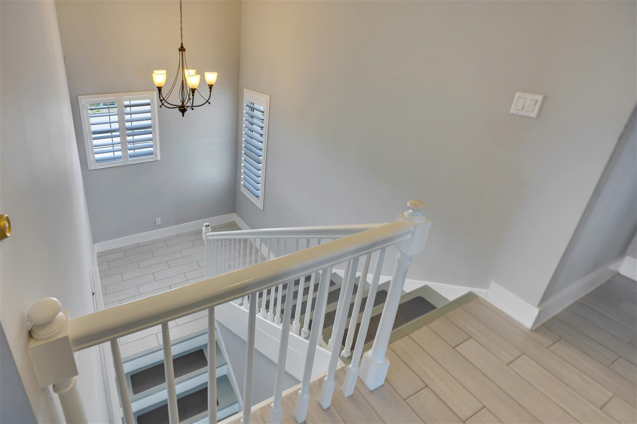 5072 Atlantic View St. Augustine, FL 32080 - Photo 16 of 40 a view of entryway and hall with wooden floor