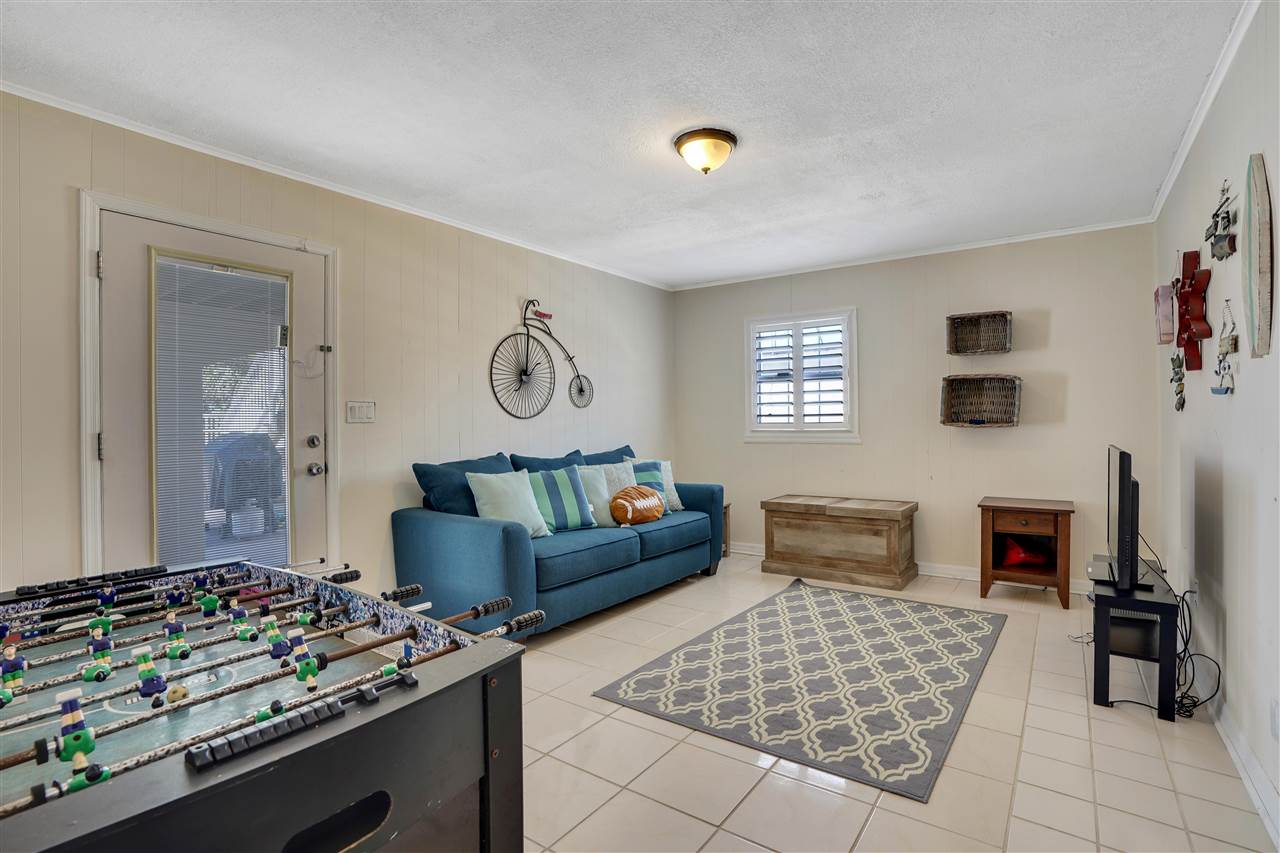 5072 Atlantic View St. Augustine, FL 32080 - Photo 33 of 40 a living room with furniture and a flat screen tv