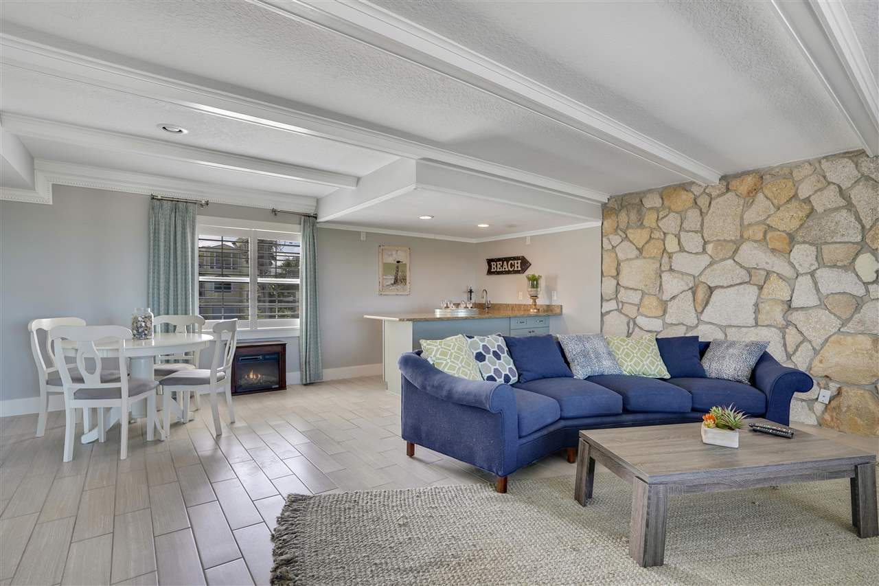 5072 Atlantic View St. Augustine, FL 32080 - Photo 8 of 40 a living room with furniture and view of kitchen