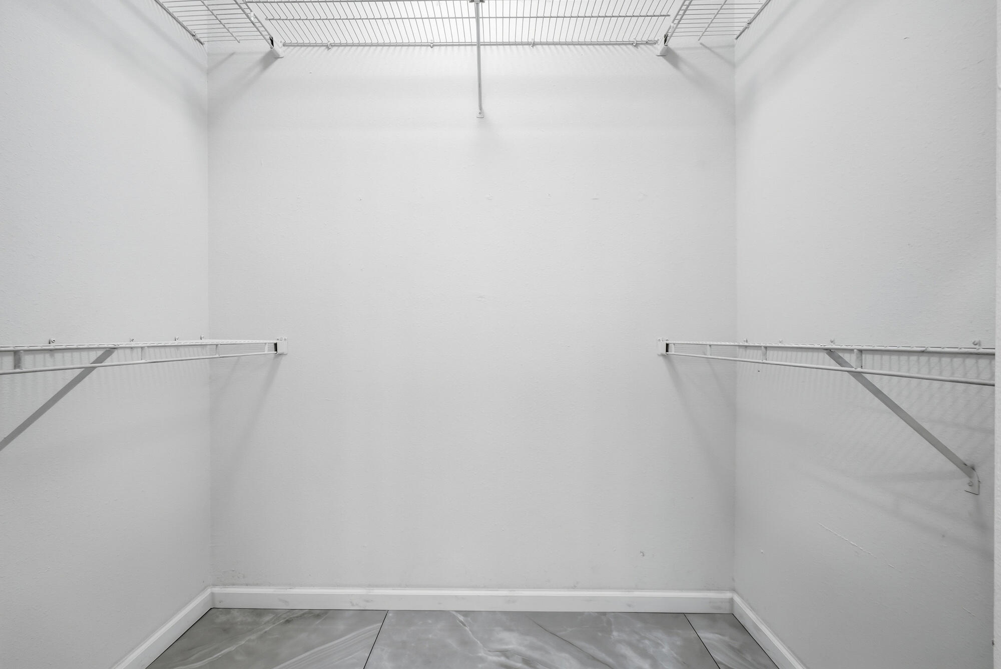 1434 Santa Anita Drive Lynn Haven, FL 32444 - Photo 21 of 38 a view of a room with racks on the wall