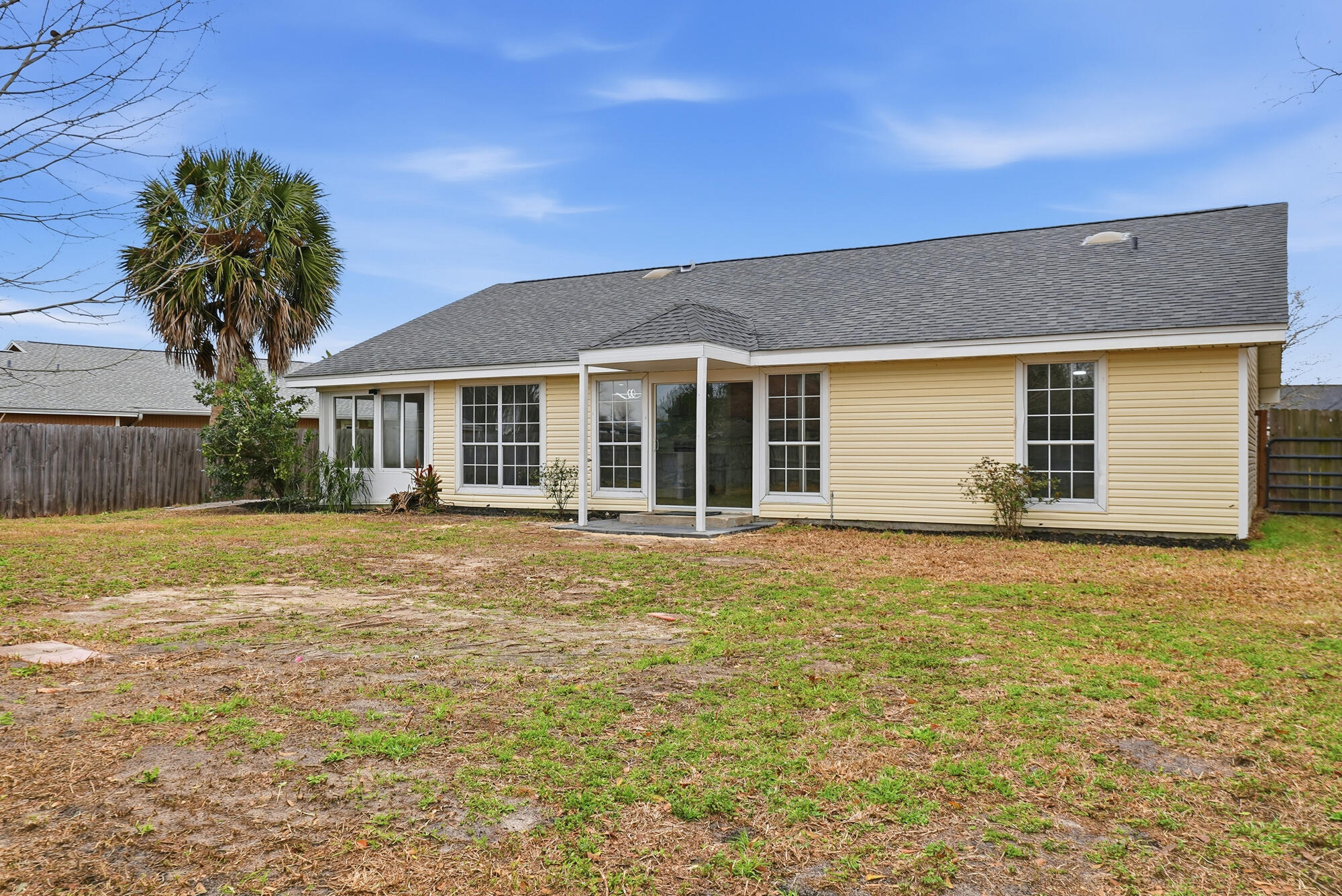 1434 Santa Anita Drive Lynn Haven, FL 32444 - Photo 31 of 38 a house view with a garden space
