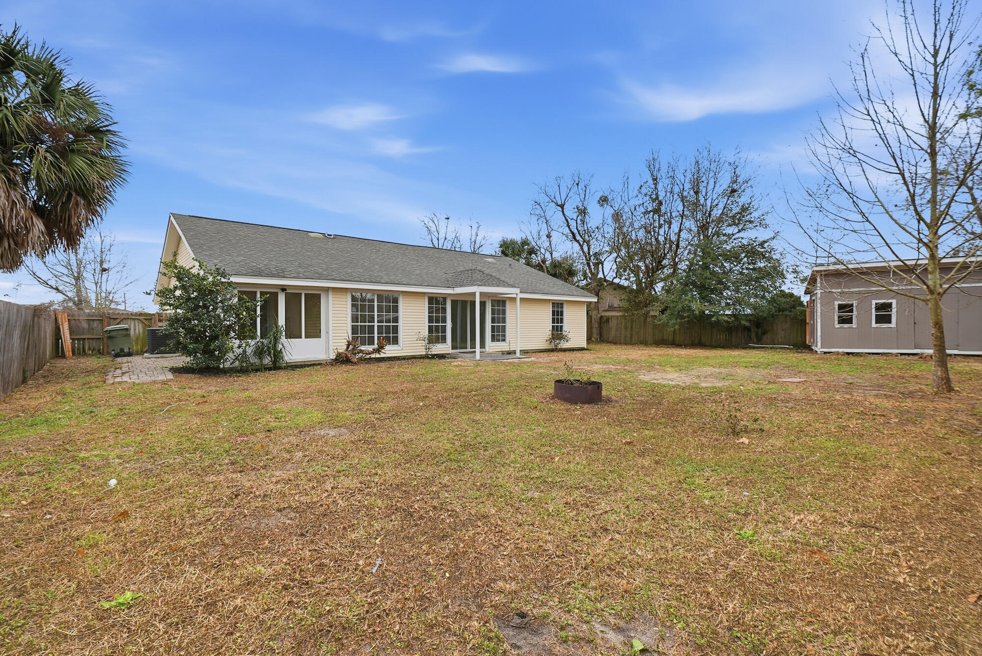 1434 Santa Anita Drive Lynn Haven, FL 32444 - Photo 32 of 38 a view of a house with a yard