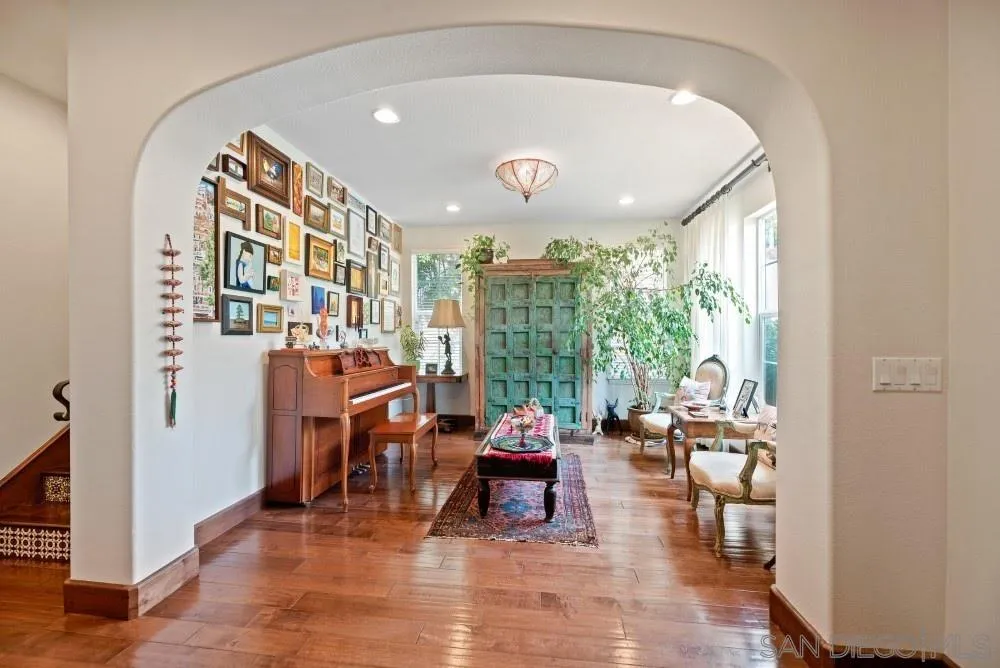 2775 Ridgegate Row La Jolla, CA 92037 - Photo 16 of 59 a living room with furniture and a large window