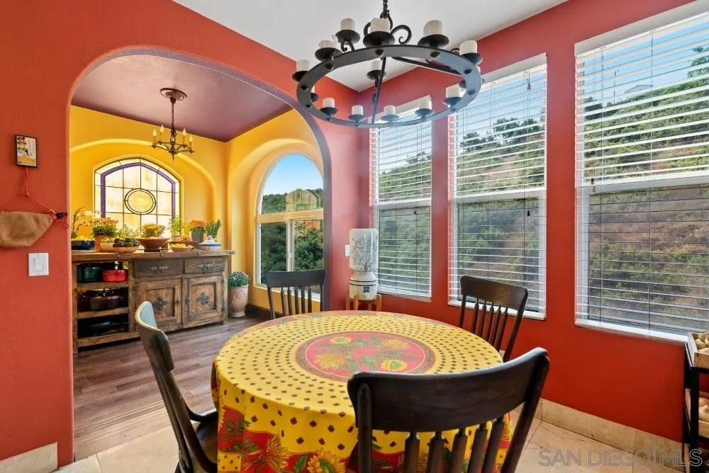 2775 Ridgegate Row La Jolla, CA 92037 - Photo 18 of 59 a view of a dining room with furniture window and outside view