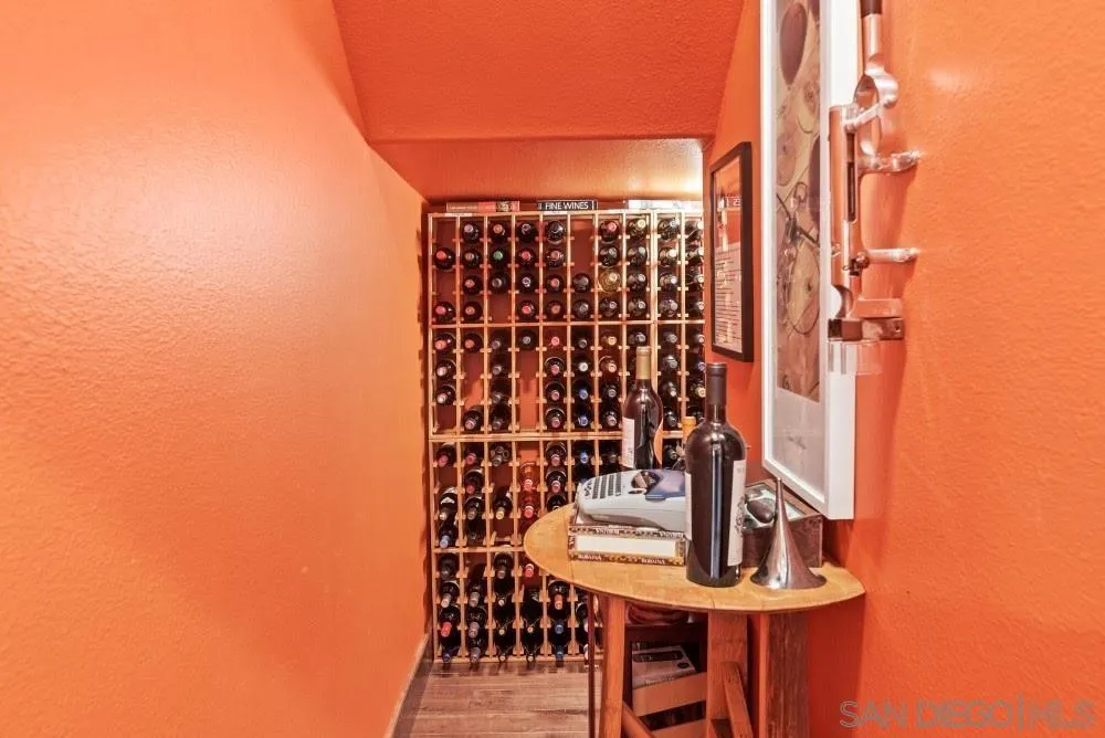 2775 Ridgegate Row La Jolla, CA 92037 - Photo 27 of 59 a balcony with table and chairs