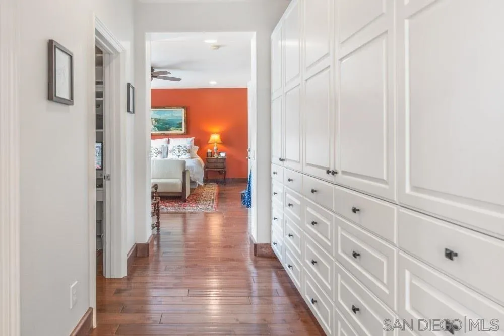 2775 Ridgegate Row La Jolla, CA 92037 - Photo 39 of 59 a view of hallway with wooden floor
