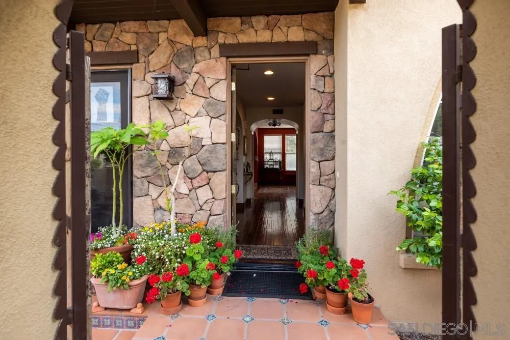2775 Ridgegate Row La Jolla, CA 92037 - Photo 4 of 59 front of a door with potted plants