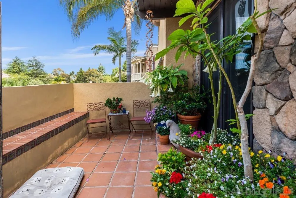 2775 Ridgegate Row La Jolla, CA 92037 - Photo 5 of 59 a view of a balcony with chairs and a potted plant