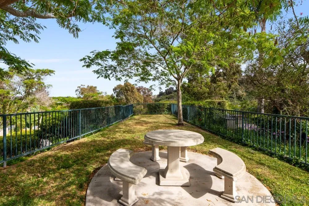 2775 Ridgegate Row La Jolla, CA 92037 - Photo 51 of 59 a view of a lake with a table and chairs