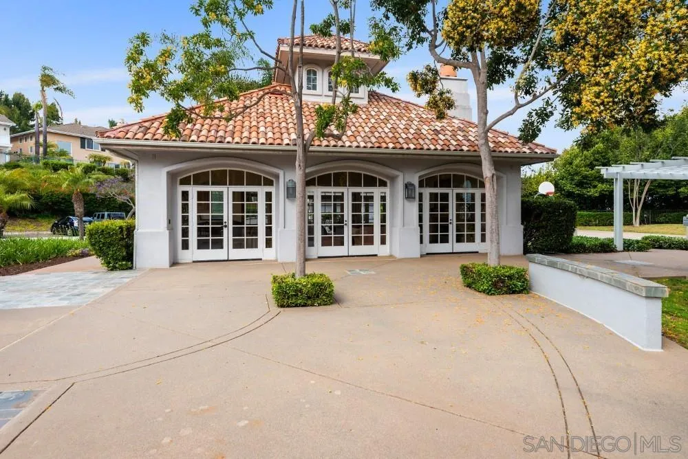 2775 Ridgegate Row La Jolla, CA 92037 - Photo 54 of 59 front view of a building with a garden