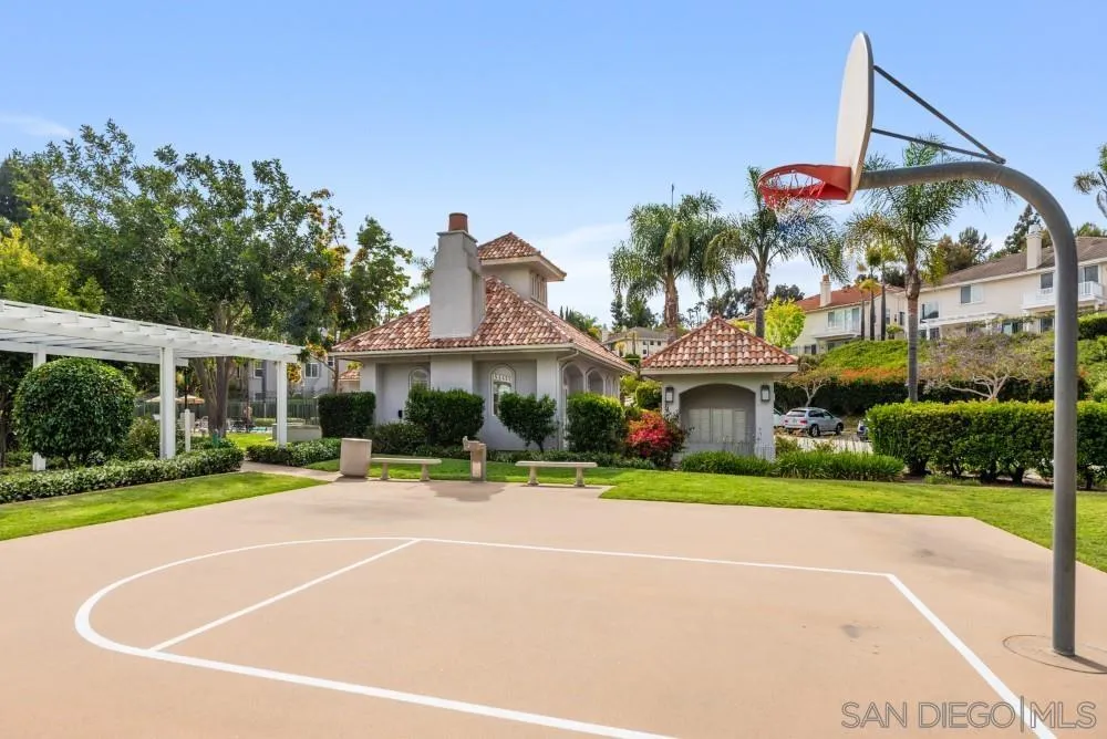 2775 Ridgegate Row La Jolla, CA 92037 - Photo 57 of 59 a palm tree sitting in front of a house with a yard