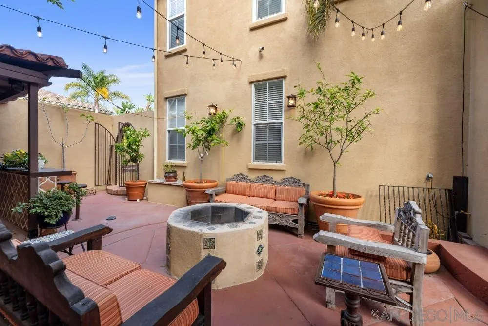 2775 Ridgegate Row La Jolla, CA 92037 - Photo 9 of 59 a outdoor space with patio the couches and a potted plant on the table
